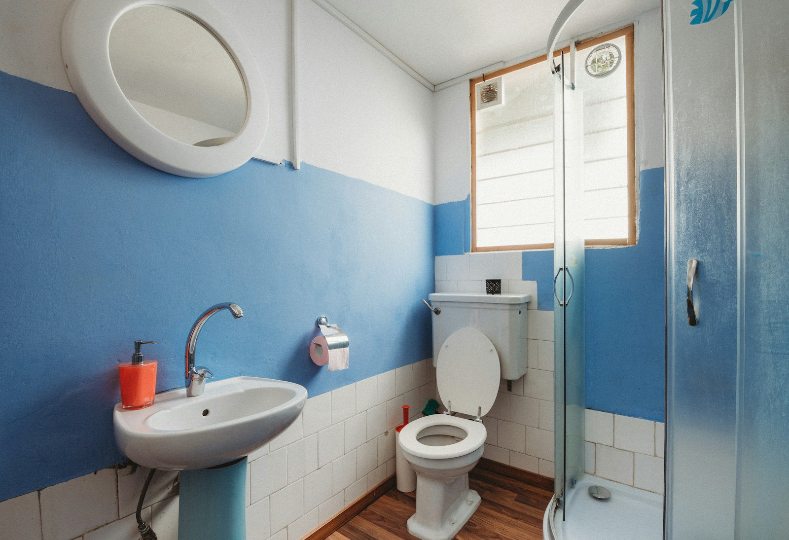 Bathroom before — old fixtures and tile