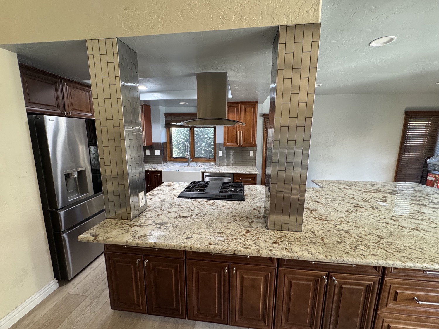 Kitchen after — custom cabinetry and new island